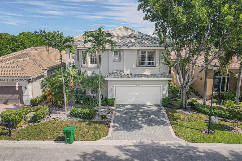 Photo of 12539 NW 58th Mnr, Coral Springs, FL 33076 (MLS # A11868640)