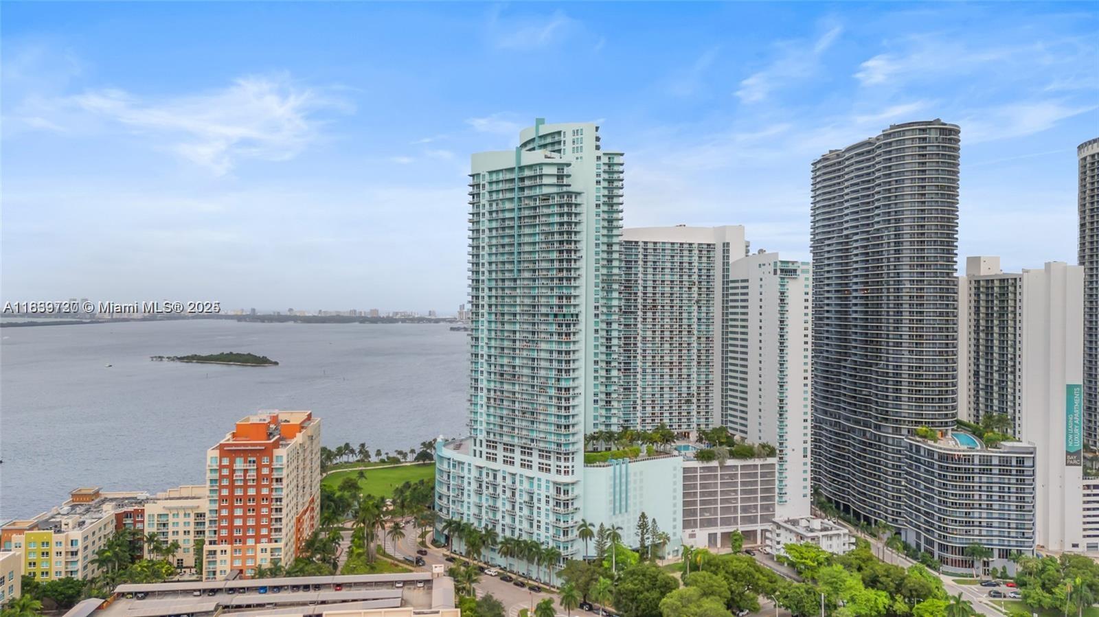 OWNER MOTIVATED One of the most desirable layouts at the popular Quantum on the Bay. Breathtaking 2 Bed 2.5 Bath w/custom made shower, plus 2nd bathroom offers a jet type tub. Wood flooring in living area. Unit has wrap-around balcony with views that stretch from Biscayne Bay to downtown Miami. Full-service building, including 2 heated pools, a 2-story gym, 24-hour security, theater room, billiard room, sauna, party rooms etc. Located across the Margaret Pace Park w/walking path, basketball, tennis & volleyball courts! Walk to Publix, restaurants, shops and museums. OPTION TO HAVE ONE MORE PARKING SPOT. Contact now for more information