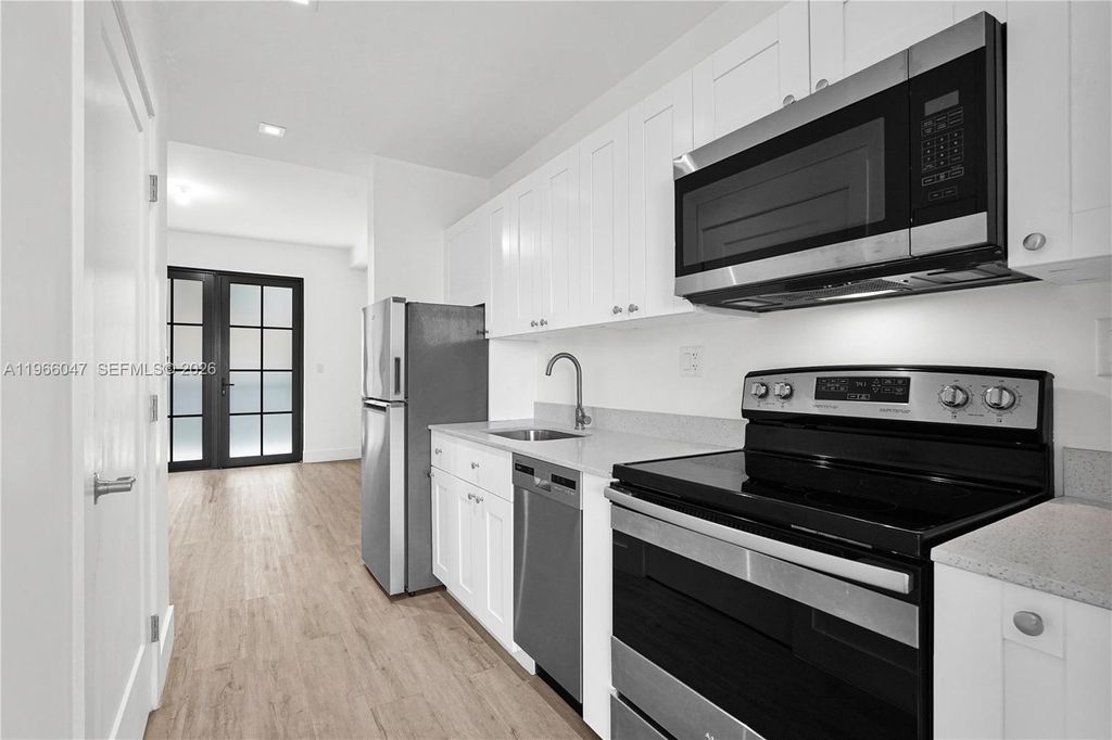 Photo of 4100 SW 64th Ave #211, Davie, FL 33314 (MLS # A11966047)