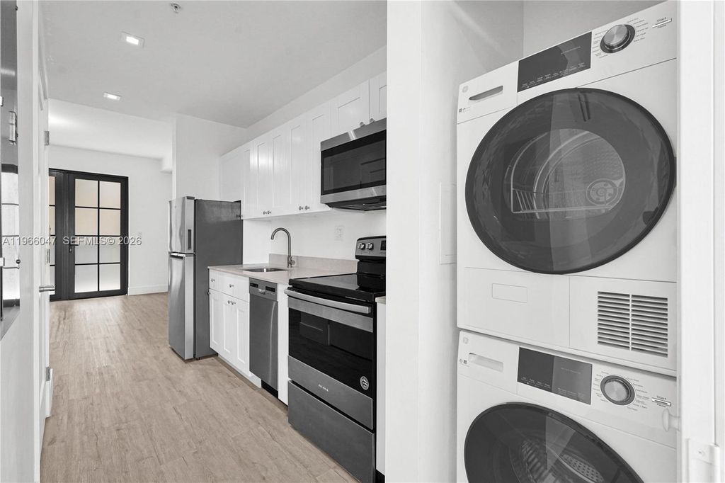 Photo of 4100 SW 64th Ave #211, Davie, FL 33314 (MLS # A11966047)