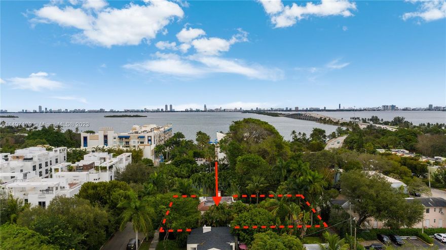 Nestled in Miami's Design District, East of US-1, this charming two-story Spanish Mission-style home is waiting for its new owner to restore it to its glory! It offers a serene family dwelling as well as a multi-family development opportunity with its T4R Zoning. Spanning 3,143 sq ft of living area, it features the main house with 3 bedrooms and 2.5 bathrooms, plus a detached 400 sq ft unit. It occupies a fenced and gated corner lot, including a two-car gated drive, vehicular access on three sides, with Crawlspace, no aerial lines,  Flood Zone X No Flood Insurance Required, Irrigation. 325amp svc, 2018 electrical panel. Teco Gas svc w/2017 on-demand water heater, dual zone HVAC. Conveniently located, Walk away from Miami Midtown, Wynwood Arts District, easy I-195 access, all without HOA.