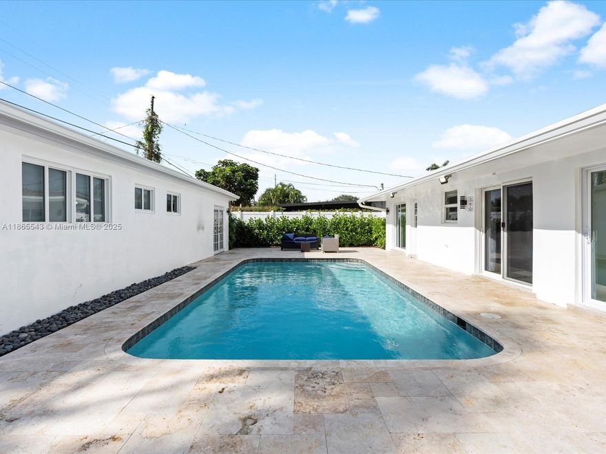 Renovated 3BR/2BA Home + Huge Guest House (Approx. 500 sqft). This unique property on Coolidge Ave offers a beautifully updated 3BR/2BA main house plus a detached guest house with Two Private 1BR/1BA suites—perfect for rental income, guests, or multi-generational living! The main home features a modern kitchen with sleek white cabinetry, stainless steel appliances, and ample storage, complemented by an elegant living area and stylish finishes. While the front yard has a long driveway with a designated carport, the backyard is a private oasis, featuring a big pool, expansive travertine patio, and lush privacy landscaping. The guest house, with separate entrances for each unit, adds incredible versatility. Conveniently located near I-95, shopping, dining, and much more for quality living.