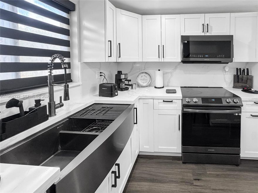 Fully renovated and beautifully furnished 2-bedroom, 1.5-bath townhouse featuring modern smart home upgrades throughout. This completely updated residence includes smart appliances, a smart A/C system, keypad entry, and a smart TV for added comfort and convenience. The home features new flooring and updated finishes throughout, along with a well-designed layout that feels comfortable and inviting. Enjoy a private porch that provides the perfect space to relax and unwind. Located in the desirable West Flagler Heritage community just minutes from Florida International University, Dolphin Mall, major highways, shopping, and restaurants.