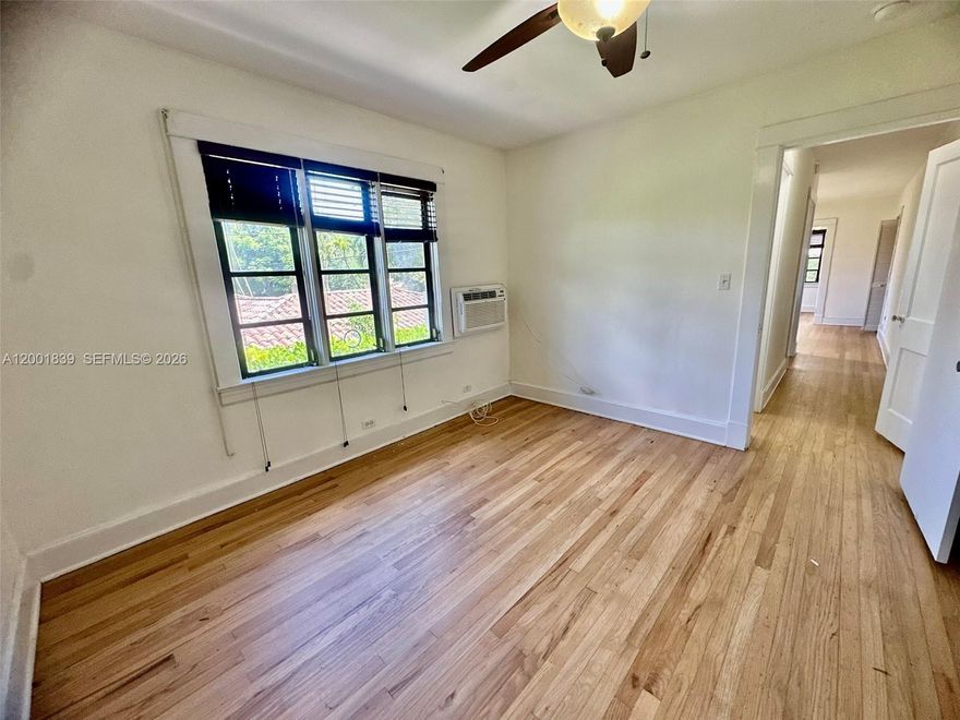 Step into this beautifully maintained one-bedroom in the heart of Coral Gables. Situated on the second floor of a quiet boutique building, the unit showcases rich wood floors. Enjoy the convenience of onsite laundry and unwind in the charming outdoor common area. With parking and water included—and no HOA approval needed—you can settle in with ease.