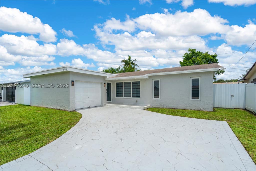 Photo of 11911 NW 32nd Mnr, Sunrise, FL 33323 (MLS # A12067249)