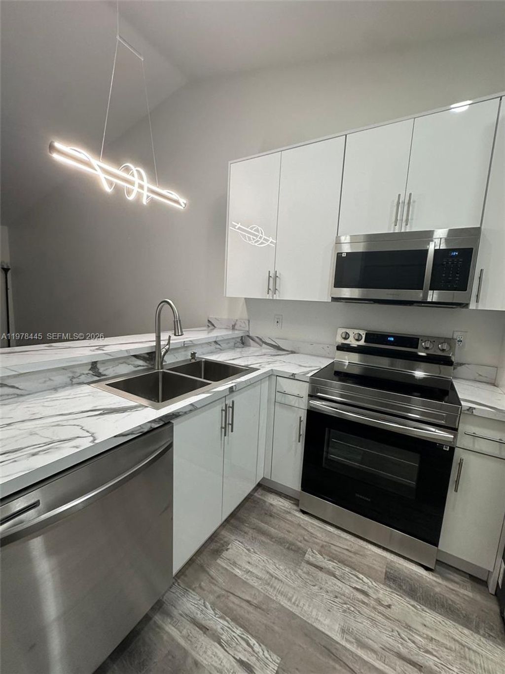 Photo of 11441-11447 NW 45th Street #11443, Coral Springs, FL 33065 (MLS # A11978445)