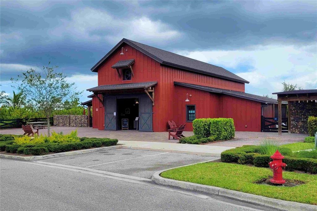 Photo of 1200 Sterling Pine Place, Loxahatchee, FL 33470 (MLS # A11975440)