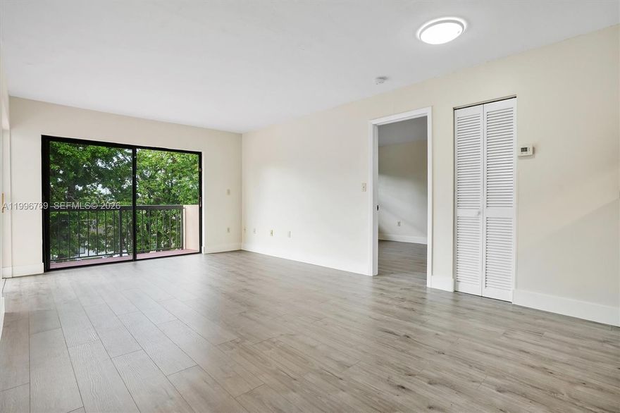 Bright 2 bed, 2 bath offering 893 SF with an open layout and strong natural light. Recently upgraded with new flooring and a renovated guest bathroom, plus washer and dryer in unit. Clean flow from kitchen to living area, perfect for daily living or entertaining. Spacious balcony set away from street noise for a quieter, more private feel. Community pool and clubhouse. Prime central location near FIU, Miami International Airport, major highways, dining, and shopping.