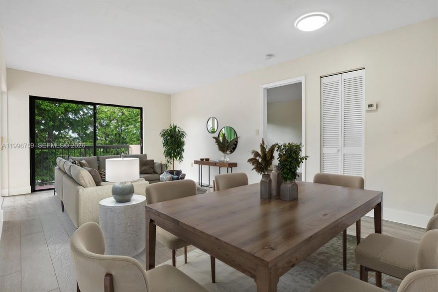 Bright 2 bed, 2 bath offering 893 SF with an open layout and strong natural light. Recently upgraded with new flooring and a renovated guest bathroom, plus washer and dryer in unit. Clean flow from kitchen to living area, perfect for daily living or entertaining. Spacious balcony set away from street noise for a quieter, more private feel. Community pool and clubhouse. Prime central location near FIU, Miami International Airport, major highways, dining, and shopping.