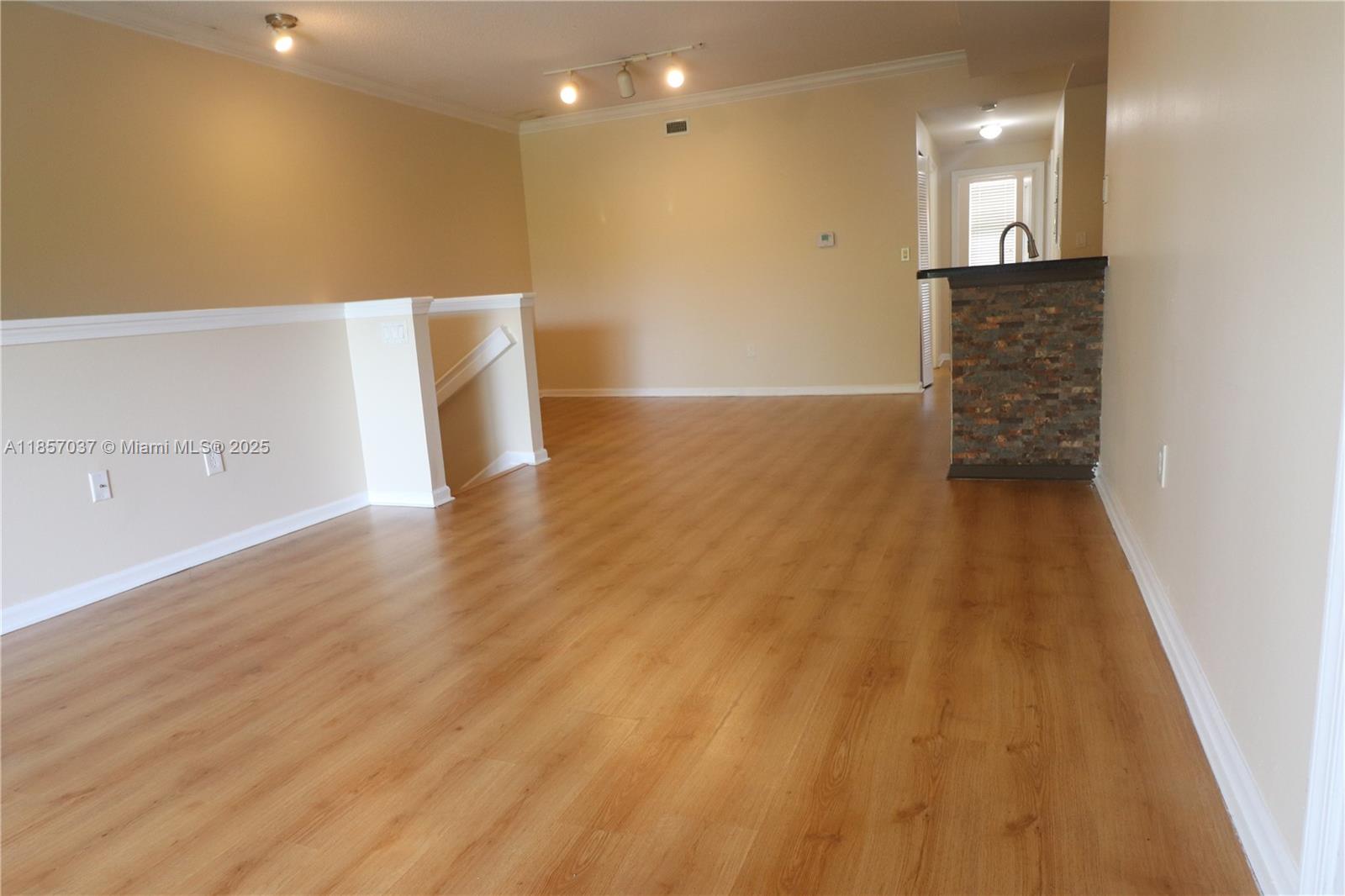 Poinciana Place very spacious and beautifully updated three bedroom two bath apartment, kitchen has granite countertops and stainless steel appliances, two way split floor plan, there is a nook in the living room that could be for working desk, walk in closets, big laundry room with full size washer and dryer and room for storage, the community has an excellent location just steps to supermarket, stores, restaurants and highway. best of all WATER, SEWER, BASIC CABLE AND INTERNET are included with the rent.