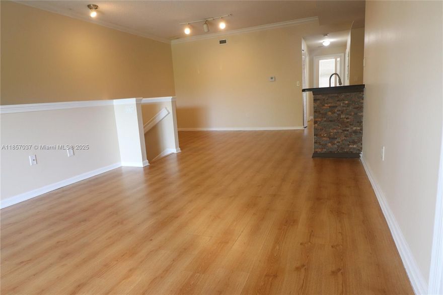 Poinciana Place very spacious and beautifully updated three bedroom two bath apartment, kitchen has granite countertops and stainless steel appliances, two way split floor plan, there is a nook in the living room that could be for working desk, walk in closets, big laundry room with full size washer and dryer and room for storage, the community has an excellent location just steps to supermarket, stores, restaurants and highway.  best of all WATER, SEWER, BASIC CABLE AND INTERNET are included with the rent.