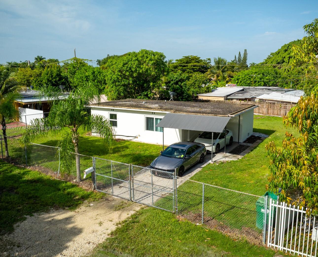 Diamond in the rough on an 8,400 sf lot in Leisure City, a residential neighborhood in North Homestead with just a 30 min commute to Miami. This 2 bed/1 bath single-family home has original terrazzo floors that can be polished. Remodel or expand with ample space to enlarge the home or add a pool. Big-ticket updates include new impact windows, new water heater, newer sewer line, 7-year-old A/C, and fresh paint. Homestead is known as the Gateway to Everglades & Biscayne National Parks, offering suburban tranquility while close to amenities such as Homestead Pavilion, Modello Park, Homestead Air Force Base, and the new Amazon distribution center. A rare chance to own a single-family home under $400K in South Florida! OPORTUNIDAD!