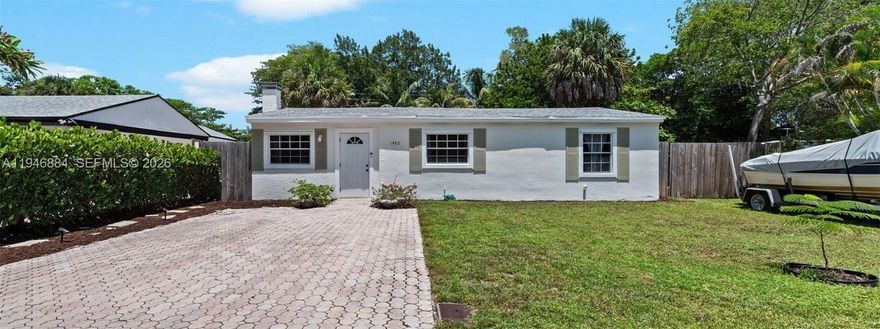 Discover this inviting 3-bedroom, 2-bathroom residence set on a prime corner lot in the heart of Fort Lauderdale. Thoughtfully updated, the home features fresh interior paint, tile and vinyl flooring, a warm fireplace, quartz countertops, updated cabinetry, and modern bathrooms. Key improvements include a 2022 roof, 2020 A/C system, new doors, and upgraded fencing. The generous backyard offers excellent potential for a future pool and includes a storage shed along with space for boat parking. Conveniently located just minutes from Fort Lauderdale-Hollywood International Airport, downtown Fort Lauderdale, and the popular shops, dining, and nightlife of Las Olas Boulevard, this property offers an ideal blend of comfort, functionality, and South Florida living, with easy access to the public boat dock at Cooley’s Landing Marina nearby.