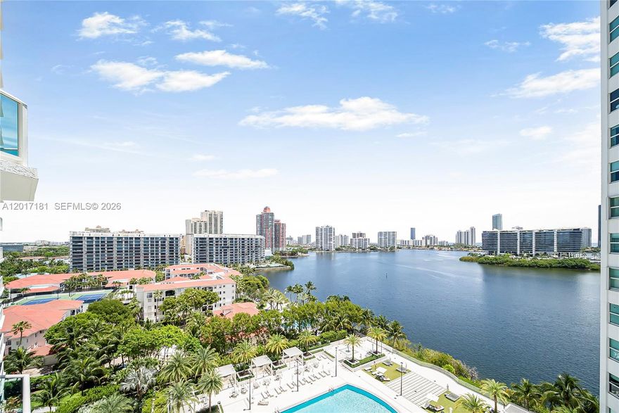 LUXURIOUS WATERFRONT LIFESTYLE – ELEGANT 3 BEDROOM, 3.5 BATH + DEN CORNER UNIT WITH WHITE CRYSTAL FLOORS AND CUSTOM CLOSETS. PANORAMIC BAY & OCEAN VIEWS FROM A MODERN, BRIGHT LAYOUT. LOCATED IN THE PRESTIGIOUS PENINSULA, NEXT TO ICONIC WILLIAMS ISLAND. RESORT-STYLE AMENITIES: CONCIERGE, SPA, GYM, TENNIS & MORE. WALKING DISTANCE TO HOUSE OF WORSHIP!