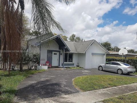 Photo of 12011 NW 33rd St, Sunrise, FL 33323 (MLS # A12002892)