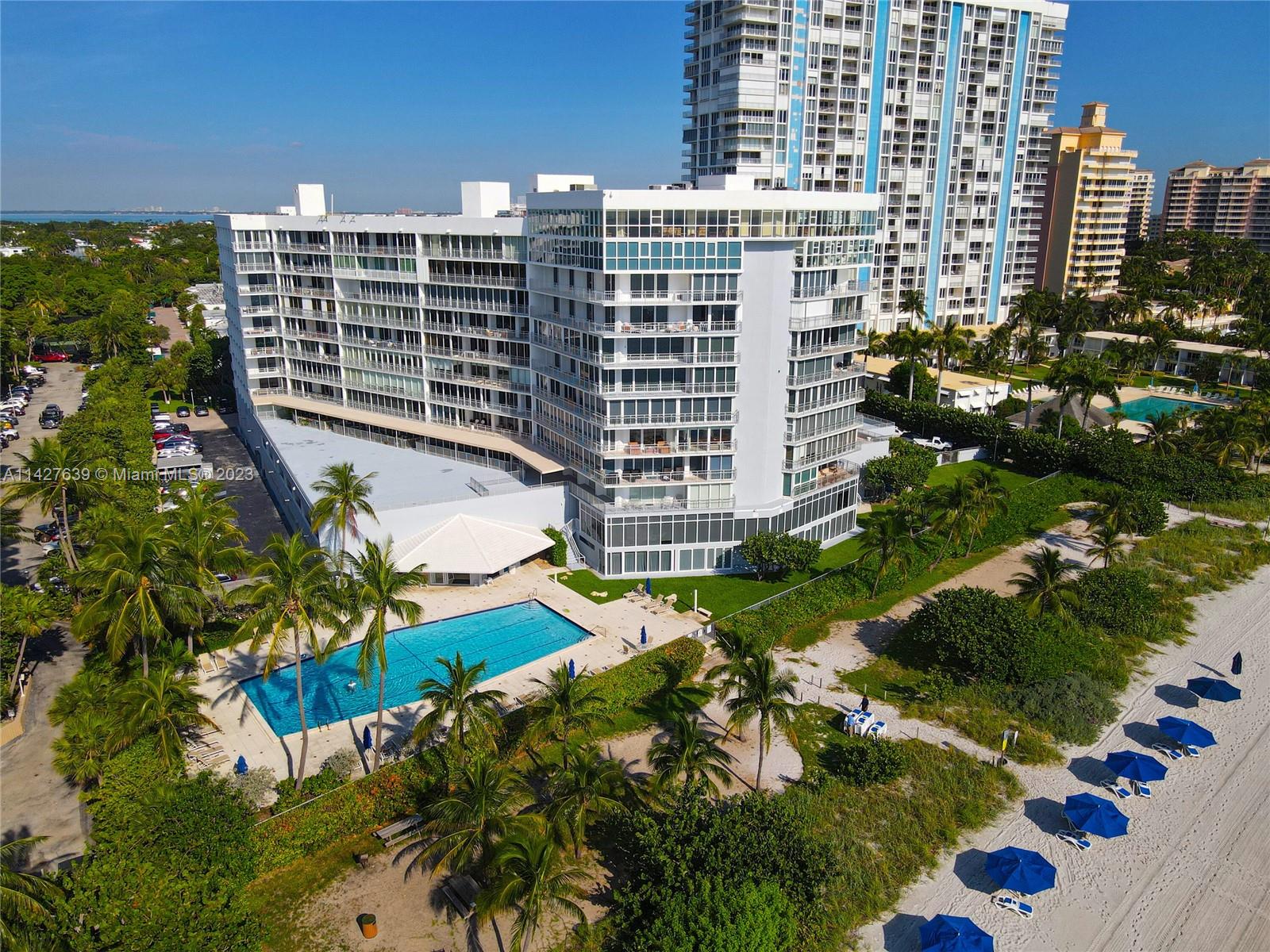 Stunningly & completely renovated, this 3 BR, 3 BA 2,690 SF flow-through unit in Mar Azul has gorgeous ocean & garden views & feels like a luxe getaway! The unit features an open concept liv & din area w/ built-in bar that incl a wine refrigerator, ideal for entertaining or a sip of wine on the balcony. The new kitchen includes ample storage, pantry, quartz counters, custom cabinets, stainless steel appliances & breakfast area w/ beautiful views. The 3 BRs are all generously sized, but the primary suite steals the show w/ its spa-like BA & one of the largest walk-in closets that you will see in a condo! There is a separate den, laundry area, & fine finishes such as large-scale tile floors & built-out closets. Enjoy living on the beach, but near the Village & all that it has to offer!