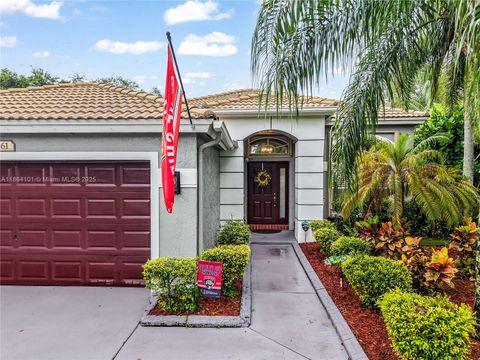 Photo of 1161 NW 130th Ave, Pembroke Pines, FL 33028 (MLS # A11864101)