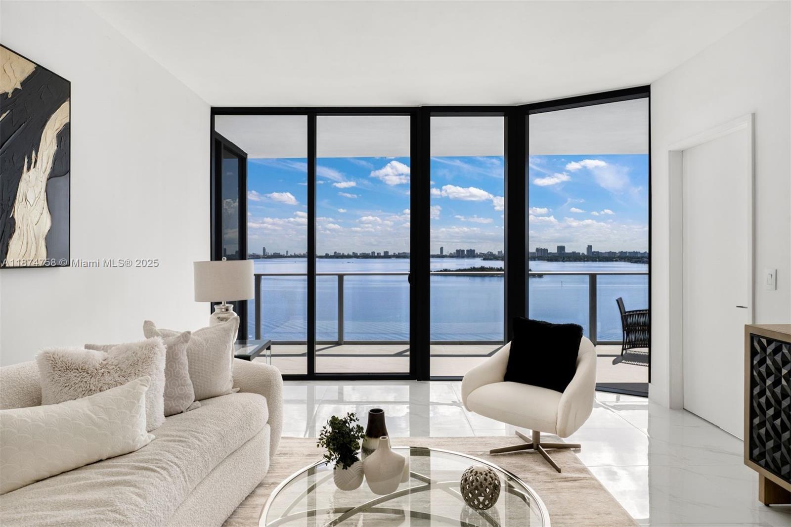 Welcome to Residence 1005 at Aria Reserve, a brand-new 3BR/3.5BA + Office waterfront home in Miami’s coveted Edgewater. Spanning 1,978 SF total, this direct Bayfront residence offers soaring ceilings, polished marble-effect tile floors, floor-to-ceiling impact glass, and private elevator access. The open-concept layout features a gourmet kitchen with custom cabinetry, quartz counters, and Thermador/Bosch appliances. All bedrooms are en suite with walk-in closets, while the principal suite boasts panoramic Bay views, spa bath with Roman tub, and glass shower. Enjoy sunrise-to-sunset views from the expansive balcony, plus 2 assigned garage spaces. Resort-style amenities include pools, spa, gym, sports courts, club rooms, children’s areas, and 547 feet of waterfront park and Bay Walk.