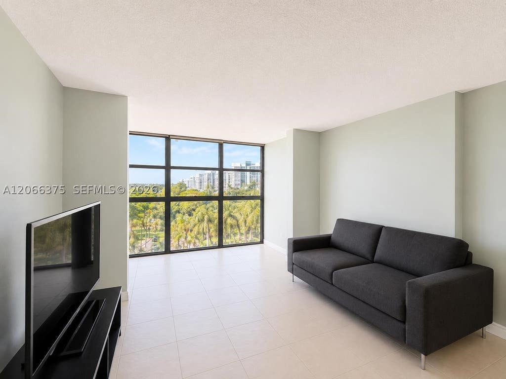 Photo of 200 Leslie Dr #727, Hallandale Beach, FL 33009 (MLS # A12066375)
