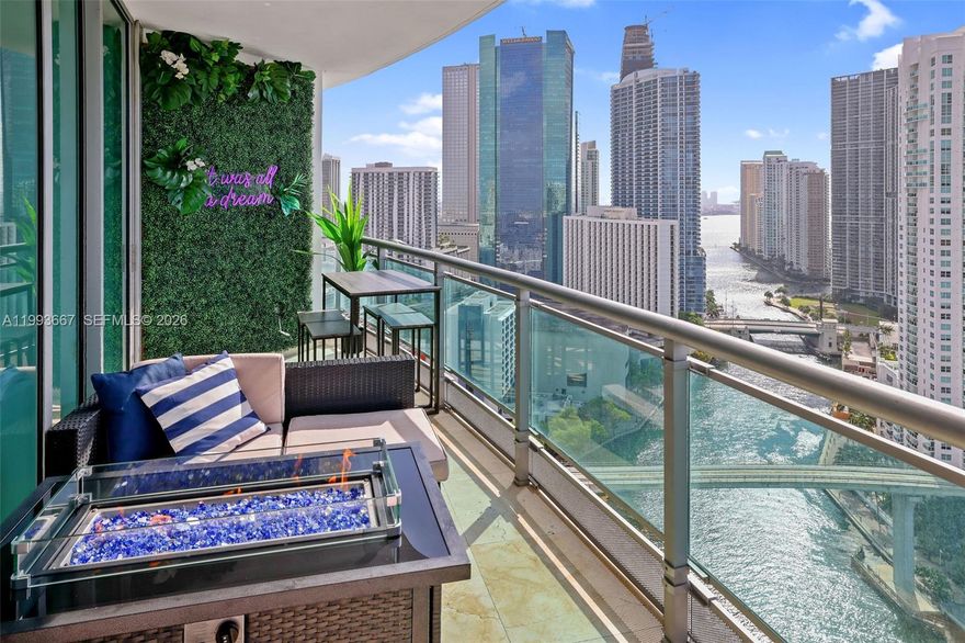 WORLD CUP EXPERIENCE Indulge in our TURNKEY FULLY FURNISHED  3 BED 2 BATH luxury suite experience, six month minimum - with breathtaking night-scape views of Miami's notorious Brickell City center and panoramic river view from the harbor to downtown.  Floor-to-ceiling windows in every room and a huge balcony with a daybed, bar table, and firepit perfect for a romantic night. This 3 bedroom suite is large enough for the family