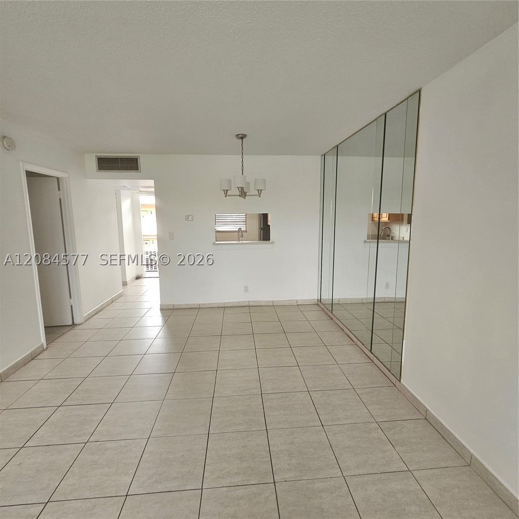 Photo of 5021 W Oakland Park Blvd #204, Lauderdale Lakes, FL 33313 (MLS # A12084577)