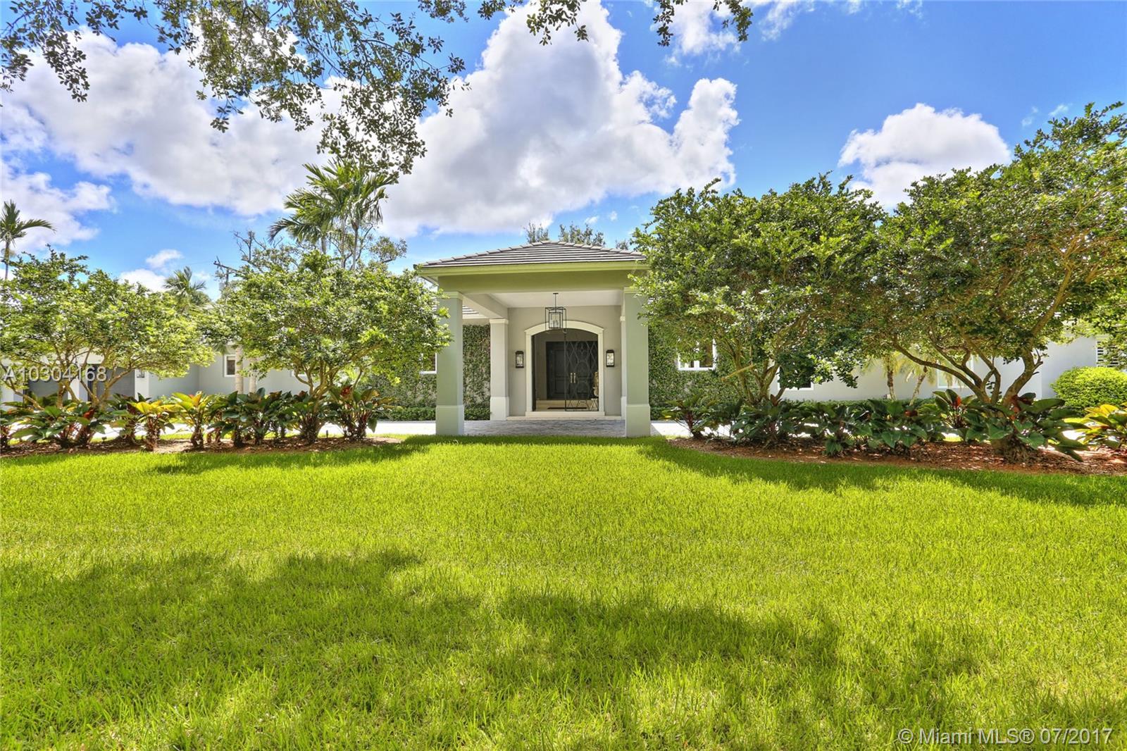This is it! The perfect golf course home renovated top to bottom & elegantly finished. Enter the porte-cochere to a gracefully appointed covered entrance & foyer where your eye is drawn to the dramatic & wide vws of the Riviera golf course! Home is defined by high ceilings, gorgeous wainscoting & moldings, lge marble flr tiles, plantation shutters, & grand spaces. Frml liv rm w/fireplace & French drs, frml din rm has large wndws & gold leaf ceiling, family rm was enhanced to give the perfect movie watching experience & den creates cozy sitting rm, office, or BR.  Master has 2 walk-in closets & lovely bath, 2 addl oversized BRs have renovated baths. Kitchen is large & open w/ high-end appliances incl Wolf stove. Addl BR w/new bath, laundry, wine cellar & 2 car gar. Lovely porch & new pool.
