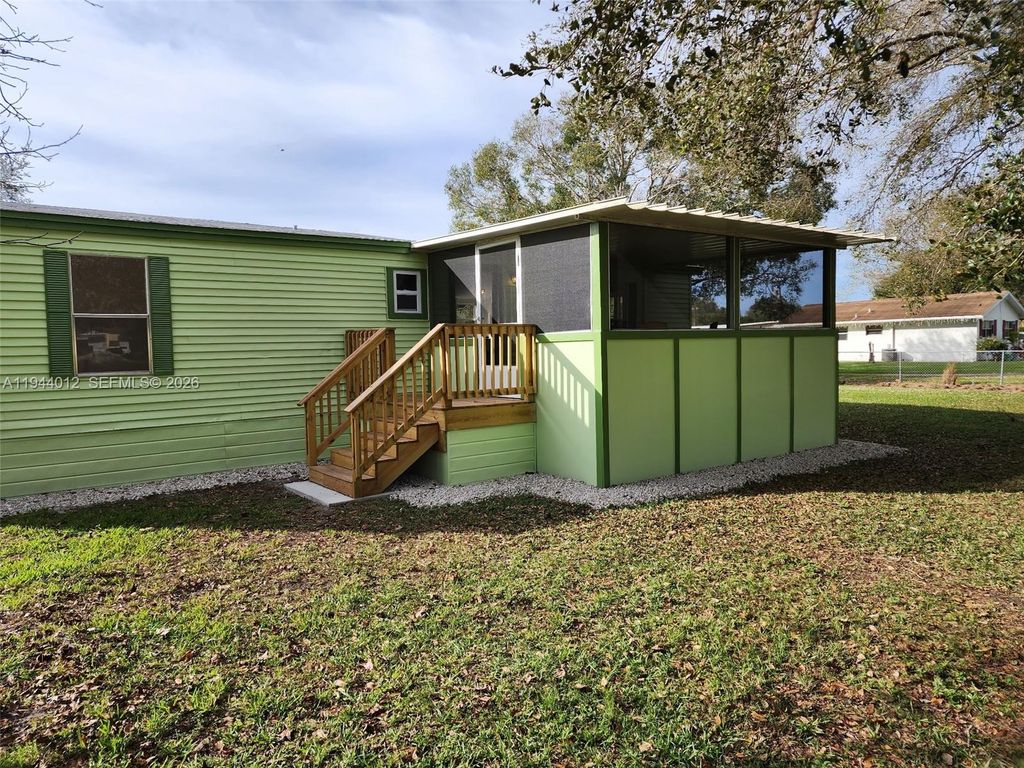 Photo of 3565 nw 10th Ave, Okeechobee, FL 34972 (MLS # A11944012)