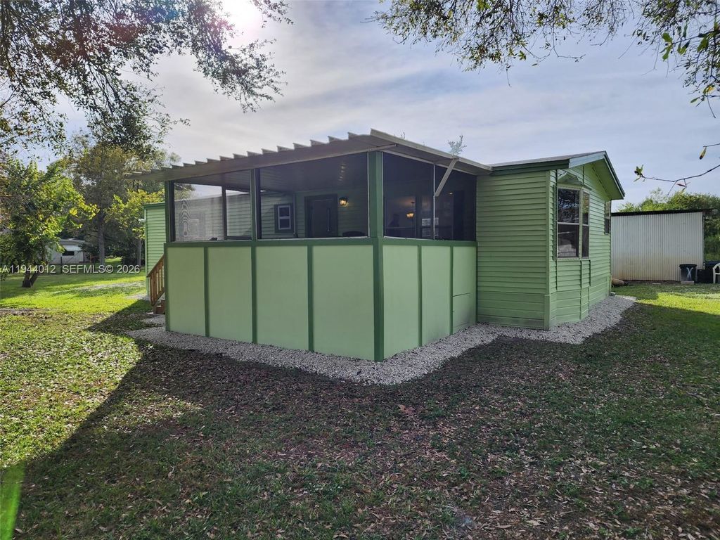 Photo of 3565 nw 10th Ave, Okeechobee, FL 34972 (MLS # A11944012)