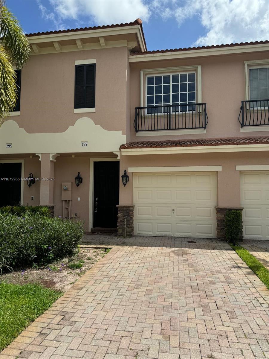 Great townhome, tile floors on 1st floor & laminated wood floors on 2nd floor & stairs. Modern kitchen w/granite counter tops, wood cabinets & SS appliances.Property features loft on 2nd floor.Laundry room on 1st floor. Master bedroom with walk-in closet. Excellent location in Weston/Sunrise/Davie area with easy access to I-595, I-75 and US-27