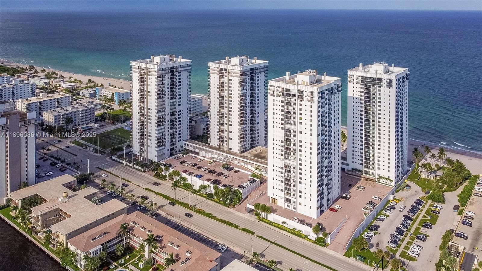 Beautiful 2BR/2BA unit in Quadomain Tower with ocean and Intracoastal views! Bright open-concept layout filled with natural light. Features accordion shutters and a convertible 2nd bedroom that can be used as extra living space, guest room, or private bedroom. Available furnished or unfurnished. Rent includes assigned parking, water, and cable. Resort-style amenities: 24/7 security, valet, beach chair service, 2 heated pools, fitness center, saunas, billiards, and on-site restaurant. Building remodeled and 40-year certification completed. Prime Hollywood Beach location just steps from sand, dining, shopping, and the Boardwalk. Seasonal rentals considered (4-month min inquire for more info). https://show.tours/e/4dK3X9j