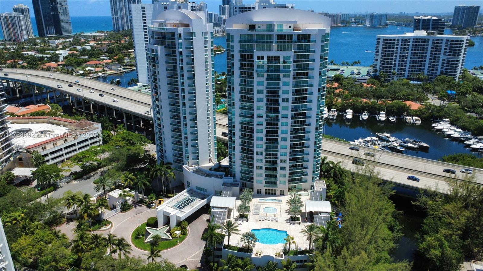 Exquisite 3/3 residence located next to the Turnberry. This high-rise sanctuary boasts a private elevator and waterfront views. The amenities include a doorman, billiards room, business center, common library, well-equipped gym, heated pool, kids playground, spa for women and men, massage room, valet parking, and a bus shuttle service ensures convenience, while the serene canal-front setting elevates everyday living.