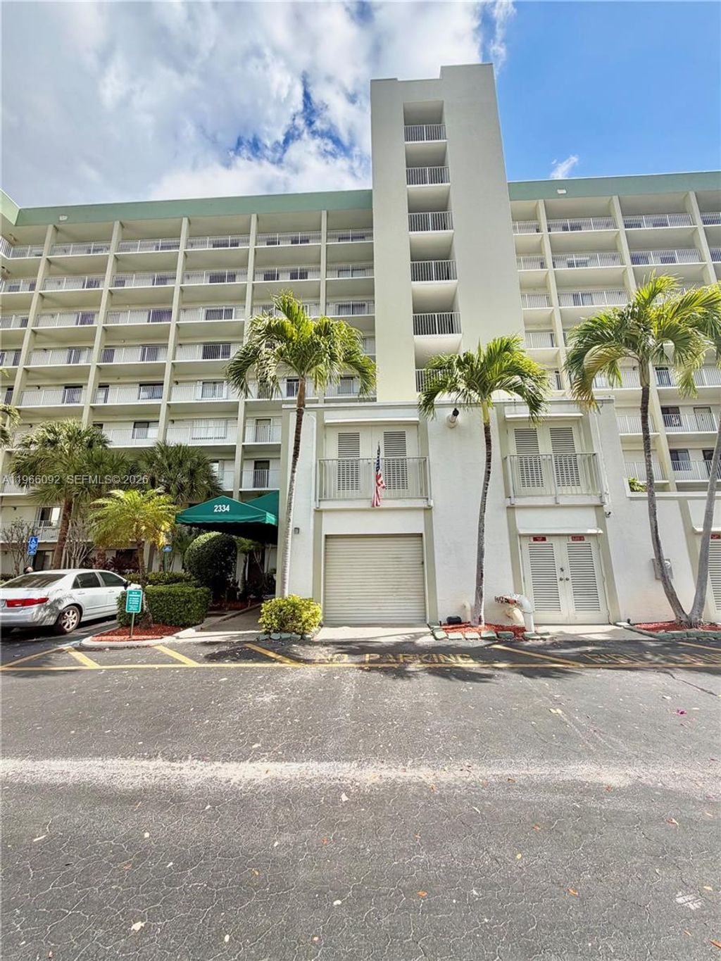 Photo of 2334 S Cypress Bend Dr #505, Pompano Beach, FL 33069 (MLS # A11966092)