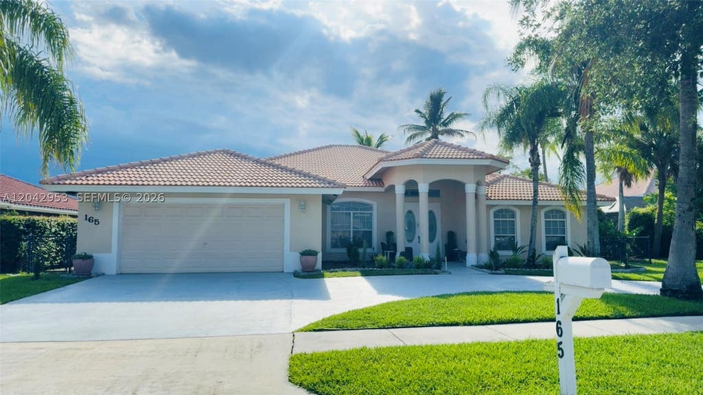 Photo of 165 Cypress Trce #none, Royal Palm Beach, FL 33411 (MLS # A12042953)