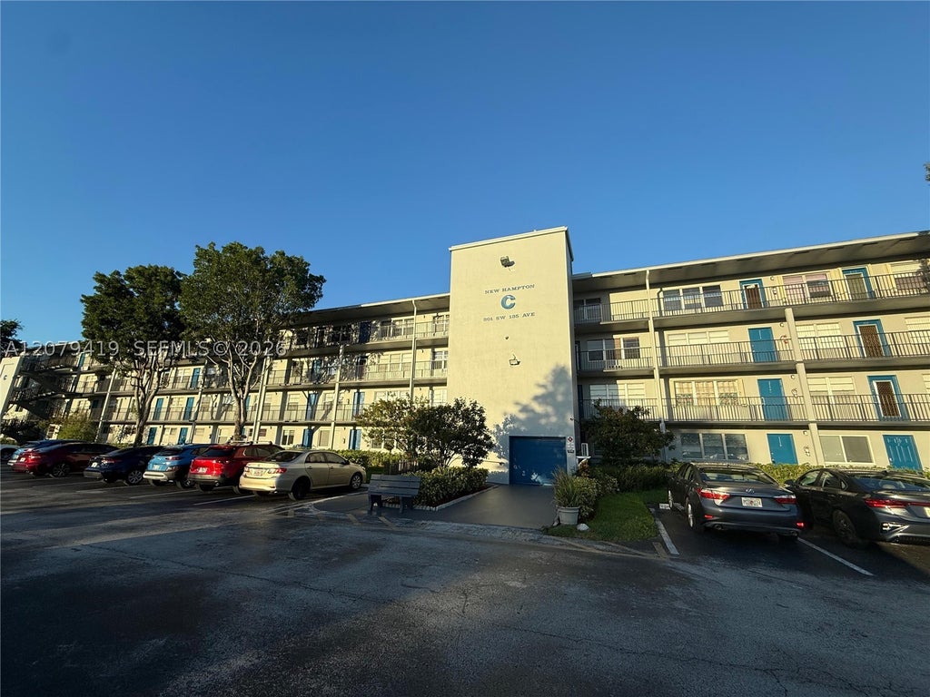 Photo of 301 SW 135th Ave #402C, Pembroke Pines, FL 33027 (MLS # A12079419)
