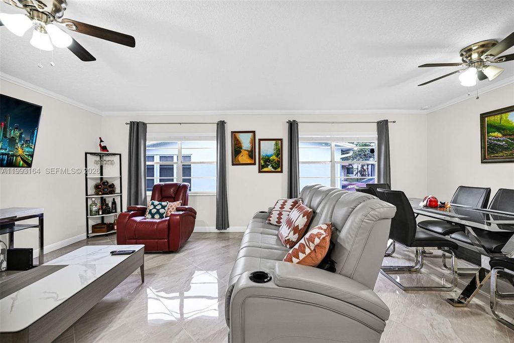 Photo of 2528 SW Natura Blvd, Deerfield Beach, FL 33441 (MLS # A11993164)