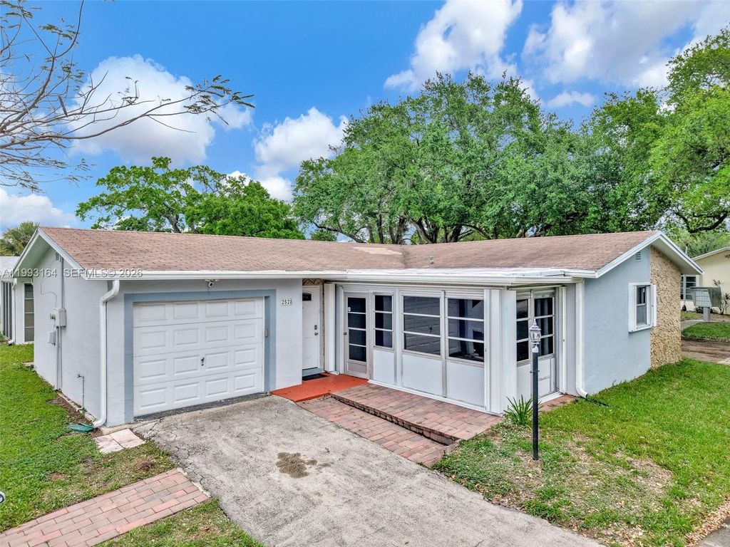 Photo of 2528 SW Natura Blvd, Deerfield Beach, FL 33441 (MLS # A11993164)