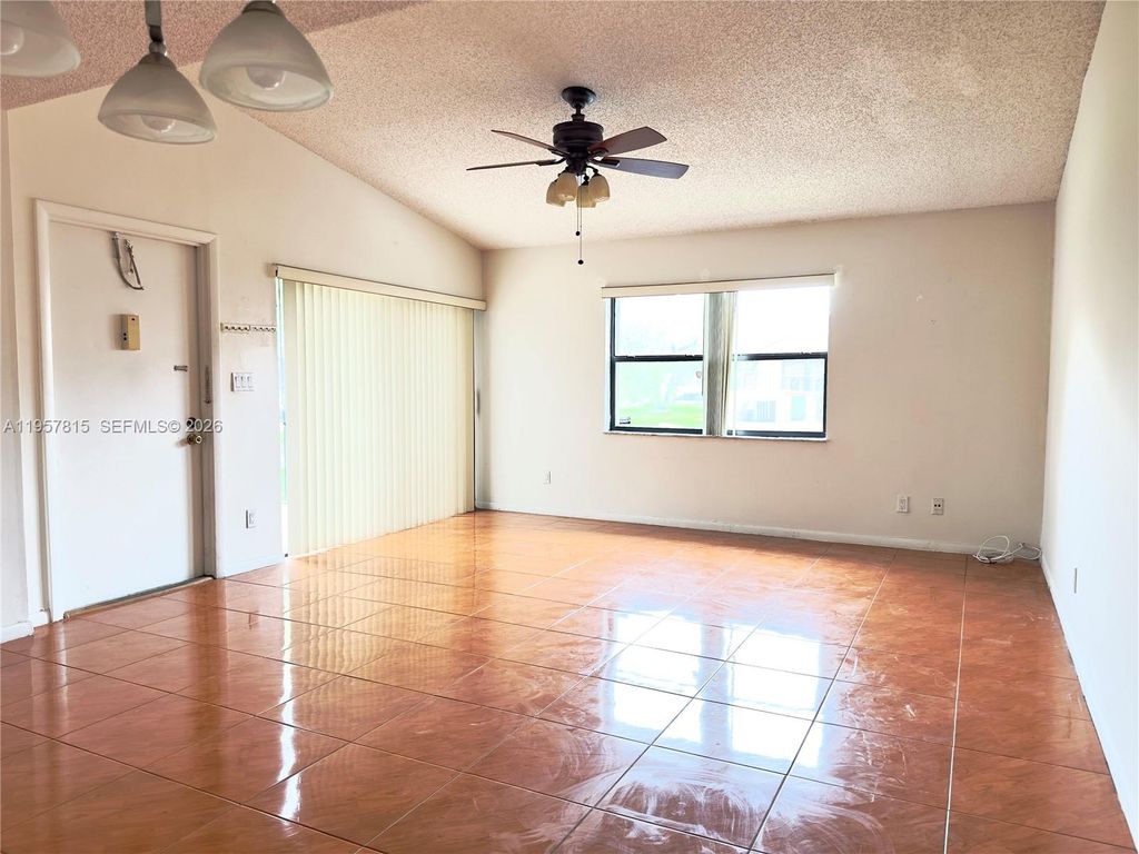 Photo of 1287 NW 123rd Ter #1287, Pembroke Pines, FL 33026 (MLS # A11957815)