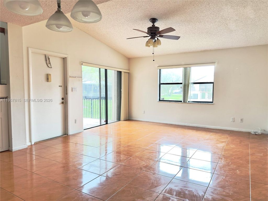 Photo of 1287 NW 123rd Ter #1287, Pembroke Pines, FL 33026 (MLS # A11957815)