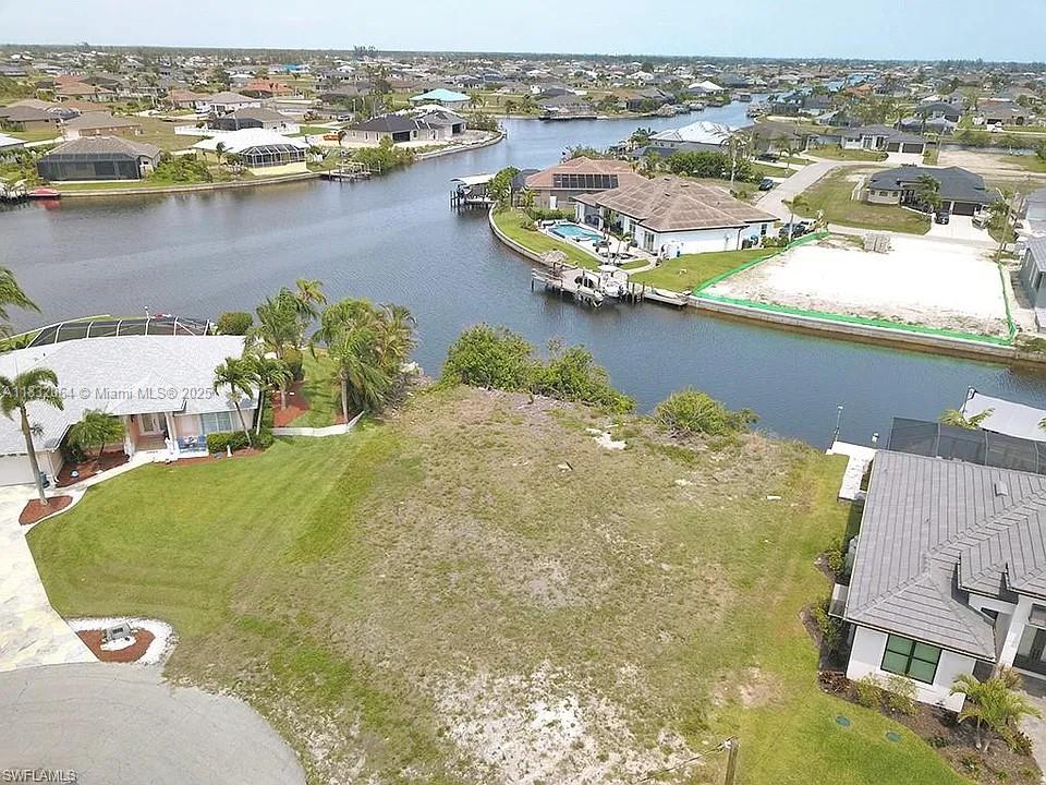 This beautiful Northwest GULF ACCESS lot is perfect for your new dream home and to keep your boat right behind your home. The irregular-shaped lot is located on a quiet cul-de-sac with approx 112 feet of waterfront. You will have an amazing view overlooking intersecting canals. Northwest Cape Coral is the upcoming area with brand new homes being built everywhere. Enjoy fishing right from your property.
