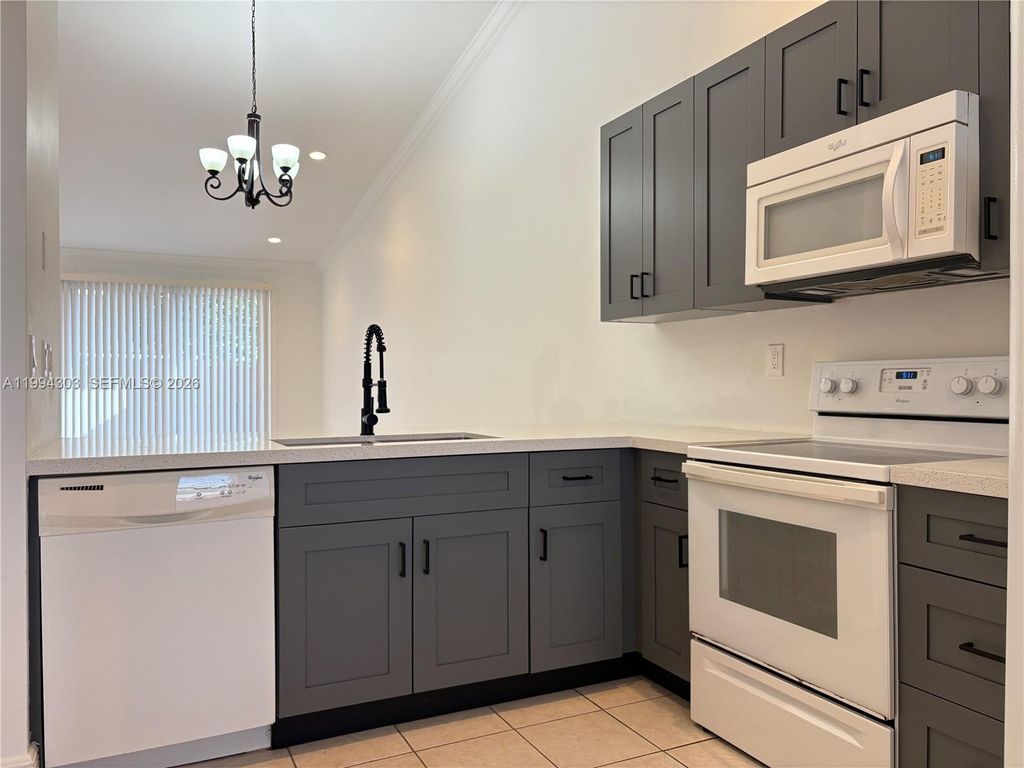 Photo of 6702 NW 190th St #6702, Hialeah, FL 33015 (MLS # A11994303)