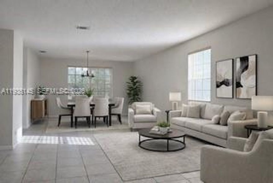 NEW LOW PRICE!! Weston-Live in "THE FALLS" a gated community across the street from Eagle Point Elementary School and close to Tequesta Lake Middle School. Perfect location to WALK TO "A" RATED SCHOOLS, shopping and parks. Enjoy this FRESHLY PAINTED, almost 3000 square feet, two-story house featuring 5 LARGE BEDROOMS and 3.5 bathrooms. ROOF 2017!  Accordion hurricane shutters throughout. HUGE PRIMARY BEDROOM WITH SITTING ROOM can be space for a home office or exercise room. There is a SECONDARY PRIMARY SUITE (or in-law's quarters) with a large closet and private bathroom. A perfect space for your extended family or visiting guests. A perfectly sized kitchen with granite countertops and backsplash and so much room for your family to hang out. 2025 Stainless steel refrigerator.  Sit at the bar or at the kitchen table that's all open to the spacious family room. Enjoy the wide lake views from the kitchen, family room and covered patio... a peaceful space with plenty of room for your own backyard pool... or just walk to the community pool and playground. This home is well priced and ready for you to update with your own personal touch!!