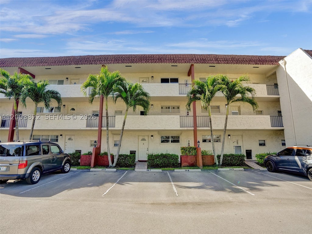 Photo of 8962 S Hollybrook Blvd #303, Pembroke Pines, FL 33025 (MLS # A12093822)