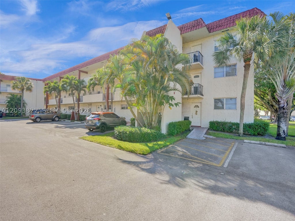 Photo of 8962 S Hollybrook Blvd #303, Pembroke Pines, FL 33025 (MLS # A12093822)