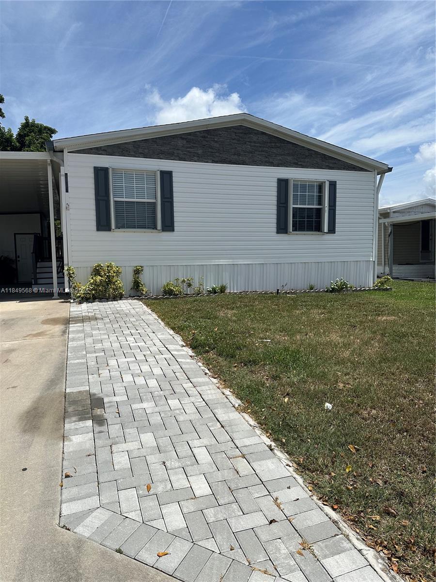 Excellent newly remodeled 3 bedroom 2 bathroom mobile home. Laminate floors and newly remodeled kitchen and bathrooms in an amazing school neighborhood, ,Low HOA and you own the land.