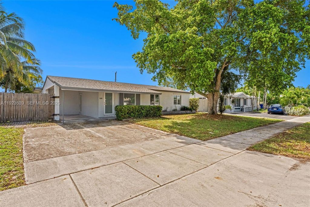 Photo of 1390 SW 50th Ave, Fort Lauderdale, FL 33317 (MLS # A11923539)