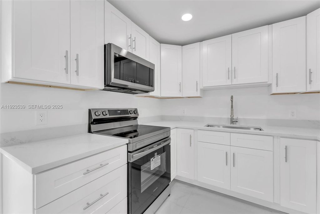 Photo of 1390 SW 50th Ave, Fort Lauderdale, FL 33317 (MLS # A11923539)