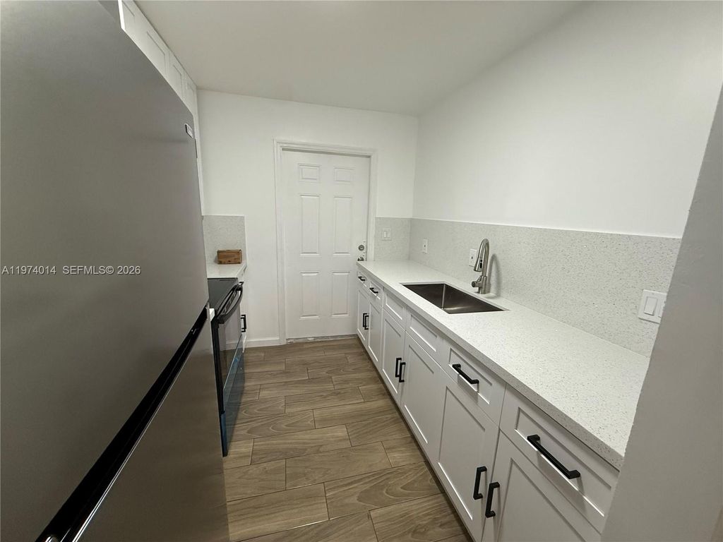 Photo of 617 NW 3rd Ave #A, Hallandale Beach, FL 33009 (MLS # A11974014)