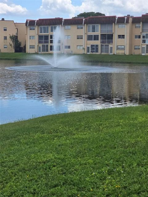 Photo of 8920 Sunrise Lakes Blvd #111, Sunrise, FL 33322 (MLS # A11887987)