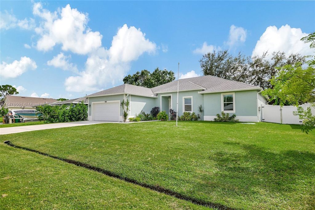 Photo of 418 SW Lakota Ave, Port Saint Lucie, FL 34953 (MLS # A11478501)