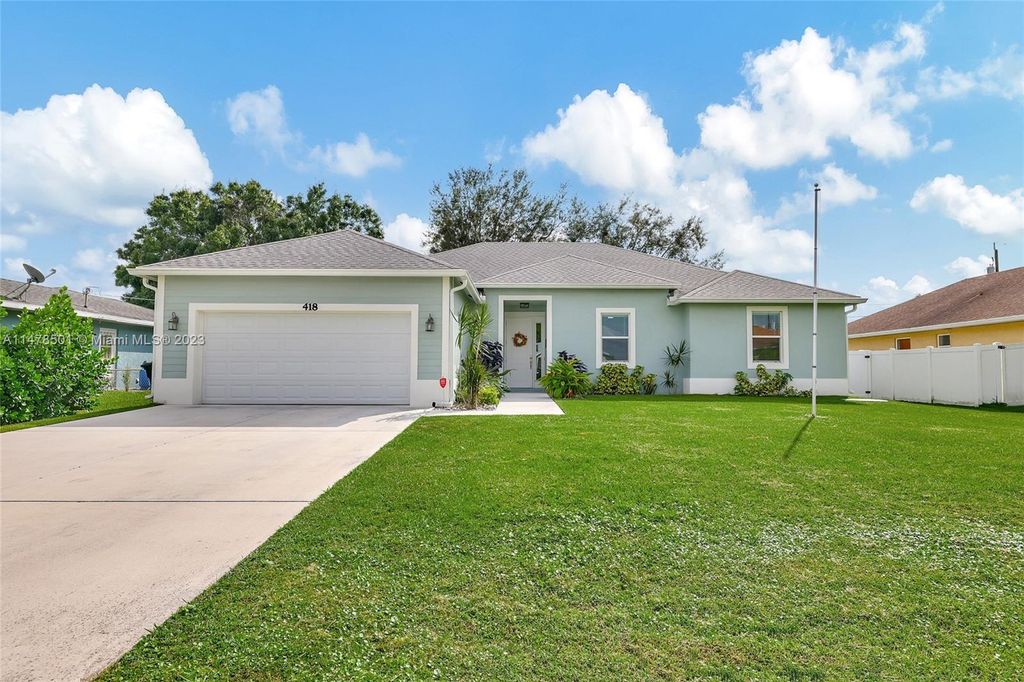 Photo of 418 SW Lakota Ave, Port Saint Lucie, FL 34953 (MLS # A11478501)